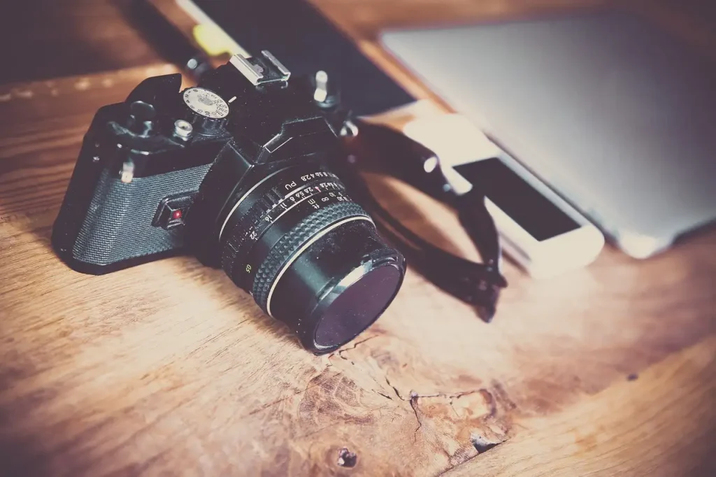 Wat was het belang van de eerste draagbare camera?