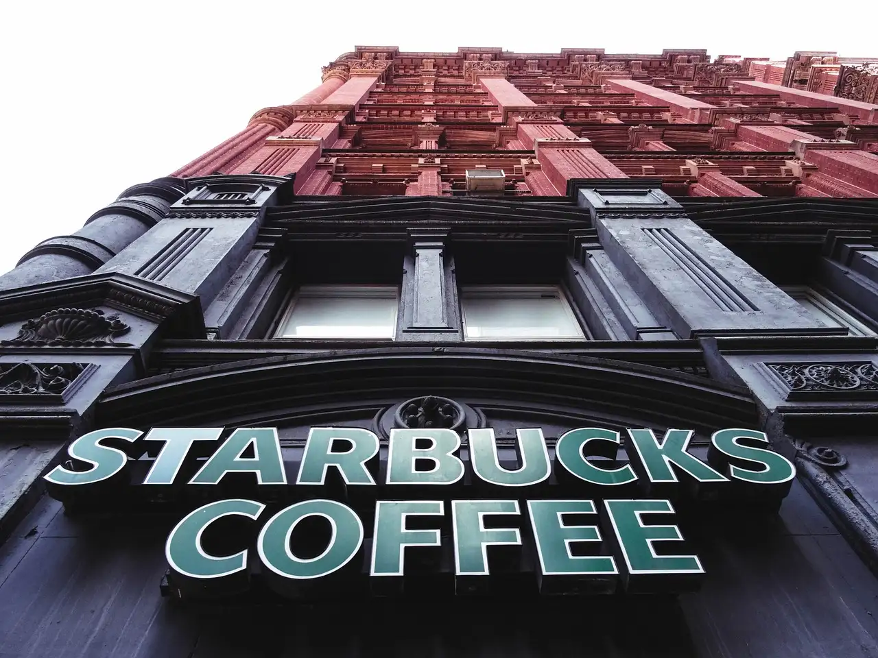 Wat is de geschiedenis van het merk Starbucks in de VS?