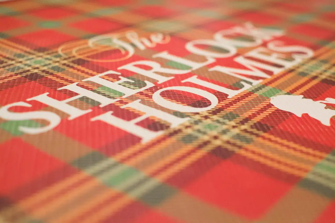 Wie schreef de beroemde verhalen over Sherlock Holmes?